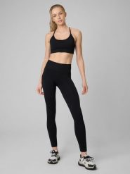 4F Legginsy treningowe bezszwowe damskie - czarne XS/S. Czarne legginsy sportowe damskie 4f, l, bez wzorów, ze skóry, z podwyższonym stanem, długie, na fitness i siłownię. Za 119.99 zł.