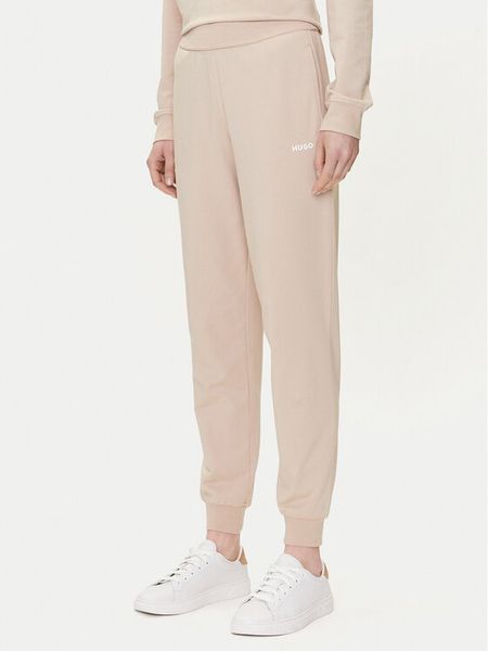 HUGO Spodnie dresowe 50490578 Beżowy Regular Fit. Brązowe spodnie dresowe damskie Hugo, m, bez wzorów, z bawełny. Za 189.99 zł.