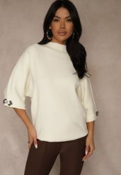 Jasnobeżowy Sweter z Cyrkoniami przy Rękawach Corentusa. Brązowe swetry damskie Renee, m, z aplikacjami, z jeansu, casualowe, bez kołnierzyka, bez ramiączek, bez kaptura. Za 79.99 zł.