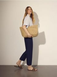 Spodnie z lnem i wiskozą - granatowy. Niebieskie spodnie materiałowe damskie Reserved, l, bez wzorów, z tkaniny. Za 139.99 zł.