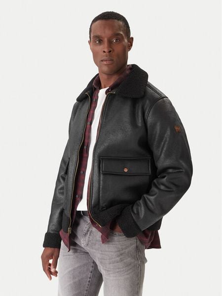 Wrangler Kurtka z imitacji skóry Shearling 112371854 Czarny Regular Fit. Czarne kurtki męskie Wrangler, m, bez wzorów, ze skóry, bez kaptura. Za 549.00 zł.