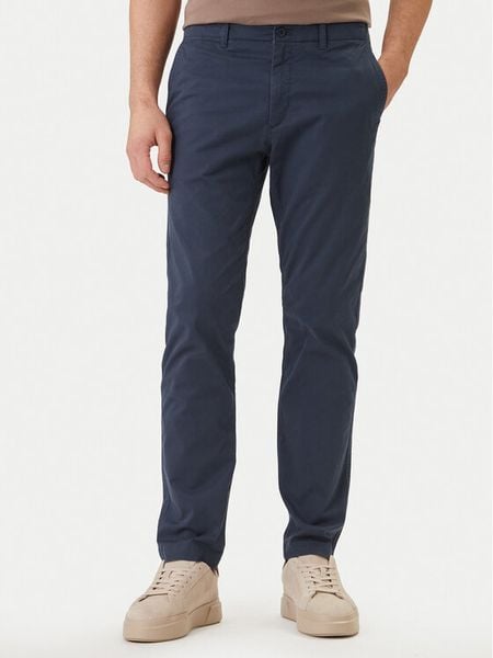 Calvin Klein Jeans Spodnie materiałowe LV04RF618G Granatowy Slim Fit. Niebieskie spodnie materiałowe męskie Calvin Klein Jeans, m, bez wzorów, z bawełny. Za 239.99 zł.