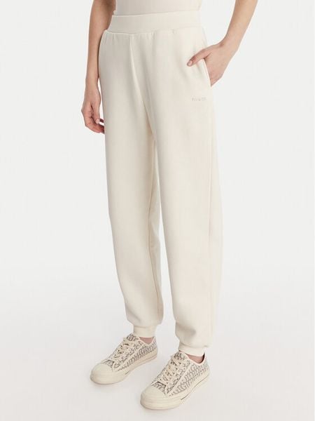 Guess Spodnie dresowe V6RB15 K9V31 Écru Regular Fit. Białe spodnie dresowe damskie Guess, m, z aplikacjami, z bawełny. Za 227.99 zł.