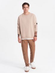 Spodnie męskie z kieszeniami cargo i ściągaczem na dole nogawki - jasnobrązowe V3 OM-PACG-0189 - XXL. Brązowe spodnie materiałowe męskie Ombre Clothing, l, bez wzorów, z bawełny. W wyprzedaży za 79.99 zł.