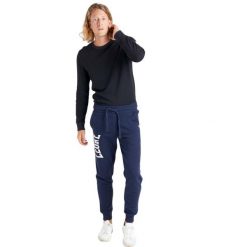 Spodnie męskie Leone 1947 Apparel. Niebieskie buty sportowe męskie LEONE 1947 APPAREL, l, bez wzorów, z tkaniny, na fitness i siłownię. W wyprzedaży za 120.40 zł.