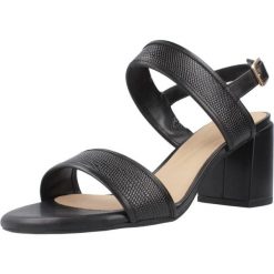 Sandały Clarks Model Ezoria Sling Kolor Czarny. Czarne sandały damskie Clarks, bez wzorów, ze skóry, bez obcasa, na obcasie, bez zapięcia. Za 372.45 zł.