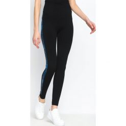 Niebieskie Legginsy Gold Gym. Legginsy sportowe damskie Born2be. Za 9.99 zł.