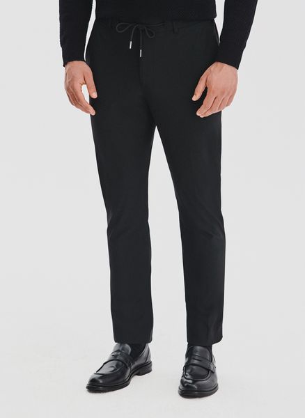 PAKO LORENTE – Czarne spodnie męskie. Czarne spodnie materiałowe męskie Pako Lorente, m, bez wzorów, z elastanu, casualowe. Za 279.99 zł.