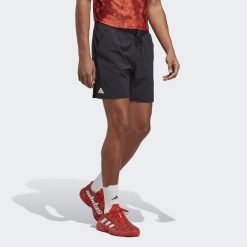 Spodenki do tenisa męskie Adidas Ergo Tennis Shorts. Czarne szorty męskie Adidas, l, bez wzorów, z elastanu, klasyczne. Za 244.40 zł.