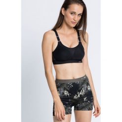 Triumph - Biustonosz Triaction Extreme Lite N. Szare biustonosze Triumph, z haftami, z elastanu. Za 189.90 zł.