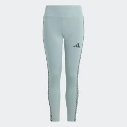 Zielone legginsy Adidas dla dziewczynki 3‑Stripe, wysoki pas, elastyczne. Niebieskie legginsy dla dziewczynek Adidas, bez wzorów, z materiału. Za 145.50 zł.
