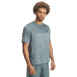 Koszulka Under Armour Tech Utility. Niebieskie koszulki sportowe męskie Under Armour, l, bez wzorów, z materiału, bez kołnierzyka, bez ramiączek, na fitness i siłownię. Za 232.30 zł.