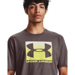 Koszulka treningowa męska szybkoschnąca Under Armour 1329581. Szare koszulki sportowe męskie Under Armour, m, bez wzorów, bez kołnierzyka, bez ramiączek. Za 129.99 zł.