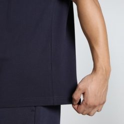 Męska koszulka polo Essentials z logo No. 1 z piki PUMA New Navy Blue. Niebieskie koszulki polo męskie Puma, m, bez wzorów, prążkowane, bez ramiączek. Za 149.00 zł.