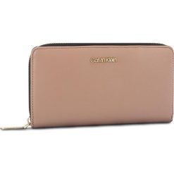 Duży Portfel Damski CALVIN KLEIN - Fold Large Zip Aroun K60K604491 007. Brązowe portfele damskie Calvin Klein, ze skóry ekologicznej. Za 299.00 zł.