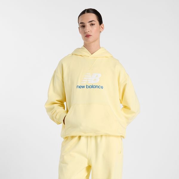 Bluza damska New Balance WT51501PRC – żółta. Żółte bluzy damskie New Balance, m, bez wzorów, z bawełny, bez kaptura. Za 269.99 zł.