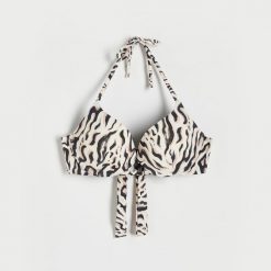 Góra od bikini ze zwierzęcym motywem - czarny. Czarne bikini damskie Reserved, bez wzorów. W wyprzedaży za 32.99 zł.