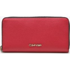 Calvin Klein - Portfel. Różowe portfele damskie marki Calvin Klein, z materiału. Za 269.90 zł.