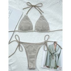 Bikini trójkątne z regulowanymi wiązaniami na plażę Tarana. Czarne bikini damskie Intica, s, bez wzorów. W wyprzedaży za 149.00 zł.