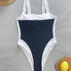 Jednoczęściowy strój kąpielowy minimalistyczny na plażę i basen Engelien. Czarne kostiumy jednoczęściowe damskie Intica, l, bez wzorów, z materiału, klasyczne, do pływania. Za 159.00 zł.