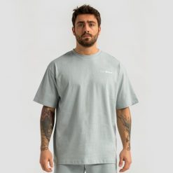 Koszulka męska fitness oversize Limitless. Zielone koszulki sportowe męskie GYMBEAM, m, bez wzorów, z bawełny, bez kołnierzyka, bez ramiączek, na fitness i siłownię. Za 73.90 zł.
