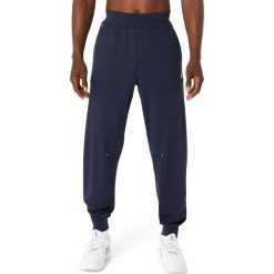 Spodnie do biegania Asics Court Warm-Up. Niebieskie spodnie sportowe męskie Asics, l, bez wzorów, z materiału, do biegania. Za 290.00 zł.