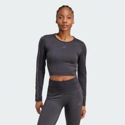 Koszulka Knit Long Sleeve. Czarne koszulki sportowe damskie Adidas, bez wzorów, z materiału, na fitness i siłownię. W wyprzedaży za 212.35 zł.
