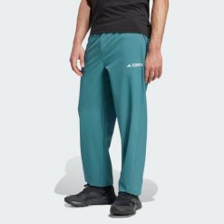 Spodnie Terrex Multi Liteflex. Niebieskie spodnie sportowe męskie Adidas, na lato, xl, bez wzorów, z materiału, trekkingowe. W wyprzedaży za 239.85 zł.