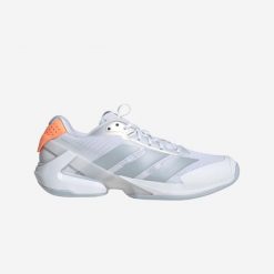 Buty tenisowe damskie ADIDAS Ubersonic 5 na każdą nawierzchnię. Obuwie sportowe damskie Adidas, bez wzorów, z tworzywa sztucznego, tenisowe. Za 669.99 zł.