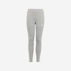 Legginsy dziecięce Adidas. Legginsy dla dziewczynek Adidas, bez wzorów, z bawełny, długie. Za 79.99 zł.