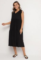Czarna Bawełniana Sukienka Ozdobiona Falbankami Aveliova. Czarne sukienki damskie Born2be, na co dzień, l, bez wzorów, z bawełny, eleganckie, bez kołnierzyka, bez ramiączek, midi, proste. Za 39.99 zł.