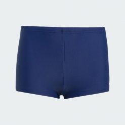 KĄPIELÓWKI DZIECIĘCE. Niebieskie kąpielówki dla chłopców Adidas, bez wzorów, z elastanu. Za 79.95 zł.