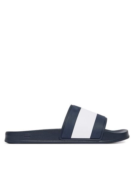 Tommy Hilfiger Klapki Core Hilfiger Flag Pool Slide FM0FM05798 Niebieski. Niebieskie klapki męskie Tommy Hilfiger, ze skóry. Za 149.99 zł.