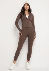Brązowy Komplet Sportowy Bluza z Wycięciem na Kciuk i Legginsy Redinelle. Brązowe bluzy sportowe damskie Born2be, l, bez wzorów, bez kaptura, do biegania. Za 139.99 zł.