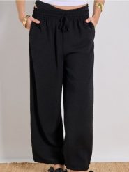 Spodnie wide leg z wiązaniem - czarny. Czarne spodnie materiałowe damskie Sinsay, l, bez wzorów. Za 49.99 zł.