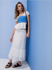 Bawełniana spódnica midi z ażurowymi elementami - biały. Białe spódnice damskie Sinsay, l, w ażurowe wzory, z bawełny, midi. Za 59.99 zł.