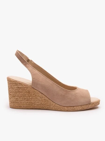 Beżowe sandały na koturnie. Brązowe sandały damskie Ryłko, bez wzorów, ze skóry, bez obcasa, na koturnie, bez zapięcia. Za 379.99 zł.