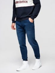 Męskie spodnie jeansowe joggery ze ściagaczem w pasie - ciemnoniebieskie V3 - Rozmiar: XXL. Niebieskie spodnie materiałowe męskie Ombre Clothing, m, z aplikacjami, z bawełny, retro. Za 239.99 zł.