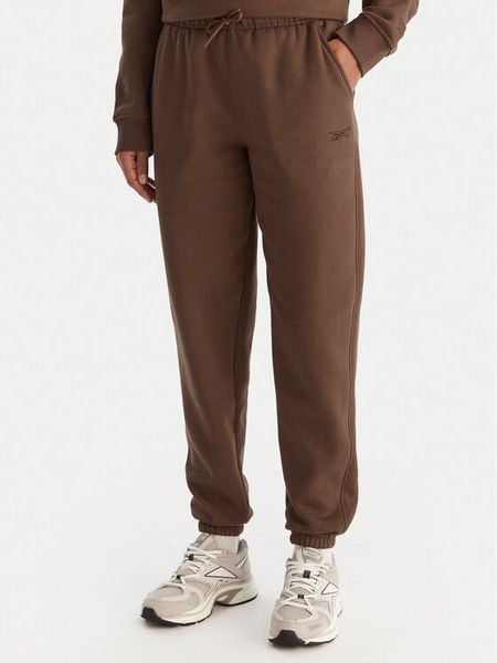 Reebok Spodnie dresowe Reebok X Ewa Chodakowska Evren RK25308CCW Brązowy Regular Fit. Brązowe spodnie dresowe damskie Reebok, m, bez wzorów, z bawełny. Za 179.99 zł.
