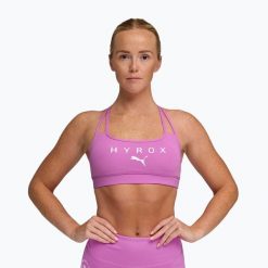 Biustonosz treningowy PUMA Hyrox Move Strappy pink. Czerwone obuwie sportowe damskie Puma, bez wzorów, na fitness i siłownię. Za 129.99 zł.