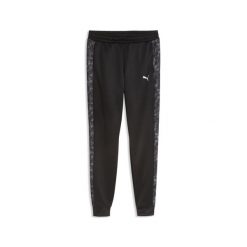 Młodzieżowe dopasowane spodnie Train All Day Essentials z nadrukiem PUMA. Czarna spodnie sportowe męskie Puma, m, bez wzorów, z materiału, na fitness i siłownię. Za 179.00 zł.