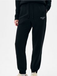 Spodnie jogger z miękkim wnętrzem - czarny. Czarne spodnie materiałowe damskie Sinsay, l, bez wzorów. Za 29.99 zł.