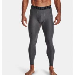 Legginsy termoaktywne męskie UNDER ARMOUR 1361586 szybkoschnące. Szare legginsy sportowe męskie Under Armour, m, bez wzorów, do biegania. Za 179.99 zł.