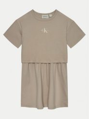 Calvin Klein Jeans Sukienka codzienna IG0IG02770 Beżowy Relaxed Fit. Brązowe sukienki dla dziewczynek Calvin Klein Jeans, bez wzorów, z bawełny, bez ramiączek. Za 209.99 zł.