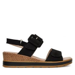 Sandały Caprice. Czarne sandały damskie Caprice, bez wzorów, bez obcasa, na koturnie, bez zapięcia. Za 189.99 zł.