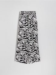 Spodnie palazzo z nadrukiem - czarny. Czarne spodnie materiałowe damskie Reserved, l, bez wzorów, z tkaniny. W wyprzedaży za 49.99 zł.