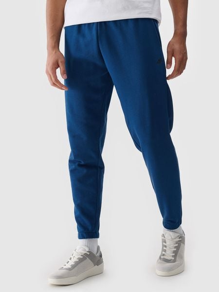 4F Spodnie dresowe joggery męskie - turkusowe S. Niebieskie spodnie sportowe męskie 4f, l, bez wzorów, z bawełny. Za 149.99 zł.