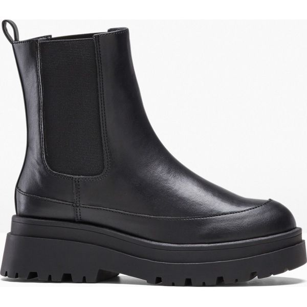 Sztyblety. Czarne botki damskie bonprix, bez obcasa, bez zapięcia. Za 189.99 zł.
