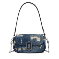 Torebka Marc Jacobs. Niebieskie torebki do ręki damskie Marc Jacobs, bez wzorów, z denimu, klasyczne, bez dodatków. Za 1,039.00 zł.