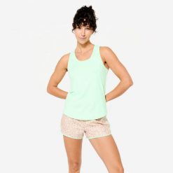 Koszulka fitness damska Domyos bez rękawów. Zielone koszulki sportowe damskie DOMYOS, bez wzorów, z elastanu, na fitness i siłownię. Za 19.99 zł.